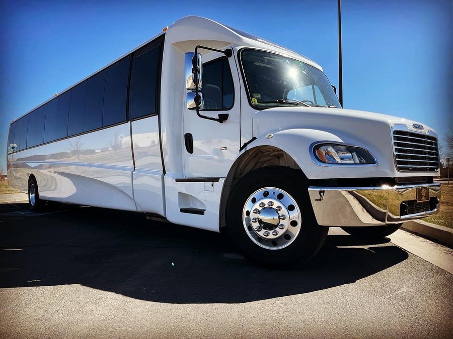 Party Bus — white 30-passenger coach